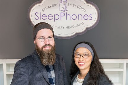 Jason Wolfe left with SleepPhones headphones on, Wei-Shin Lai right with SleepPhones on, creators of Sleep Sounds artificial intelligence