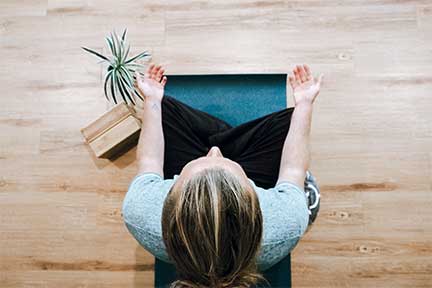 practitioner meditating to tame monkey mind