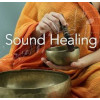 practitioner creating healing sounds