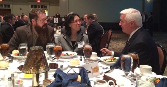 wei-shin and jason speaking with the governor of pennsylvania